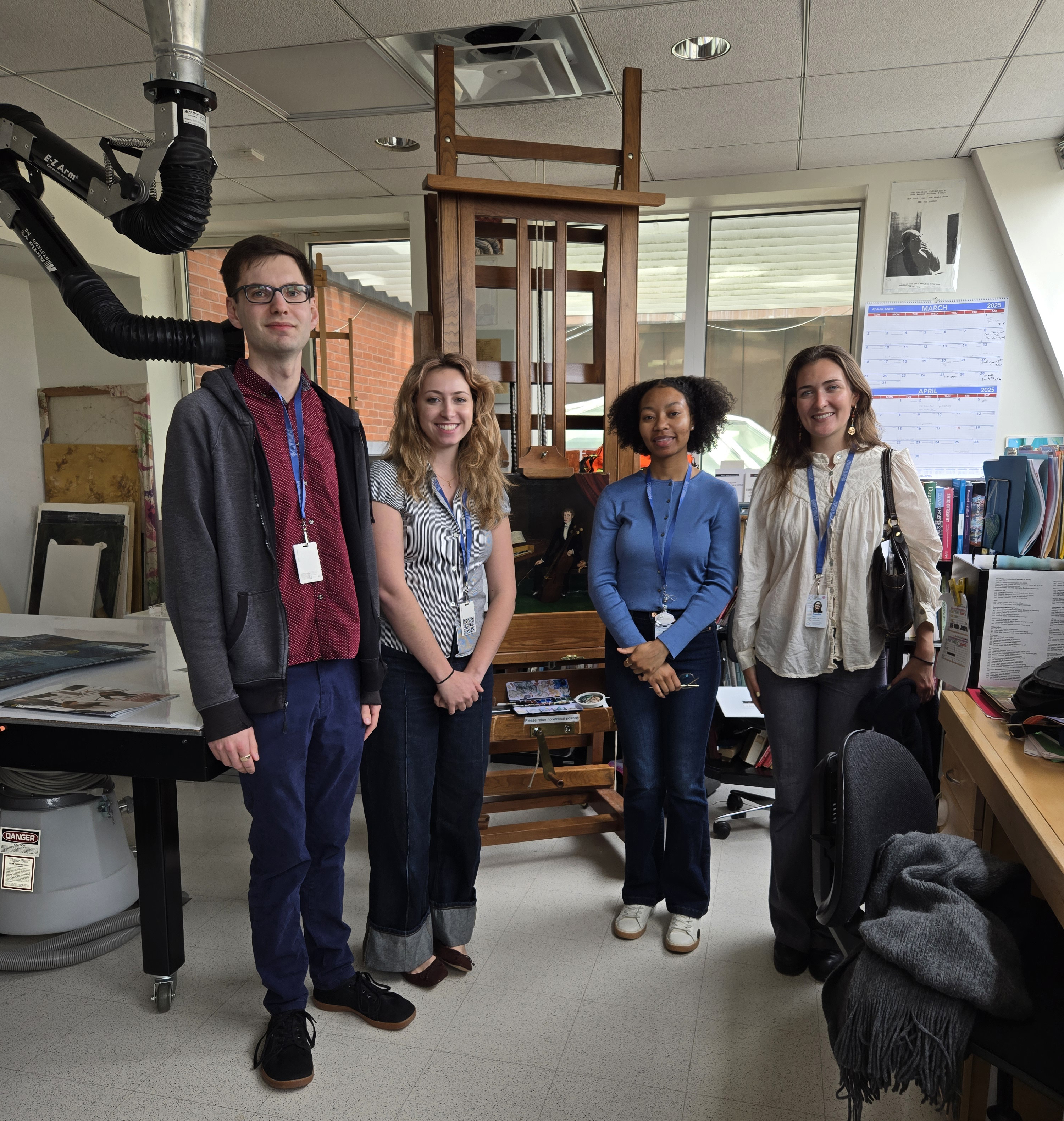 Spring 2025 interns standing in the conservation studio